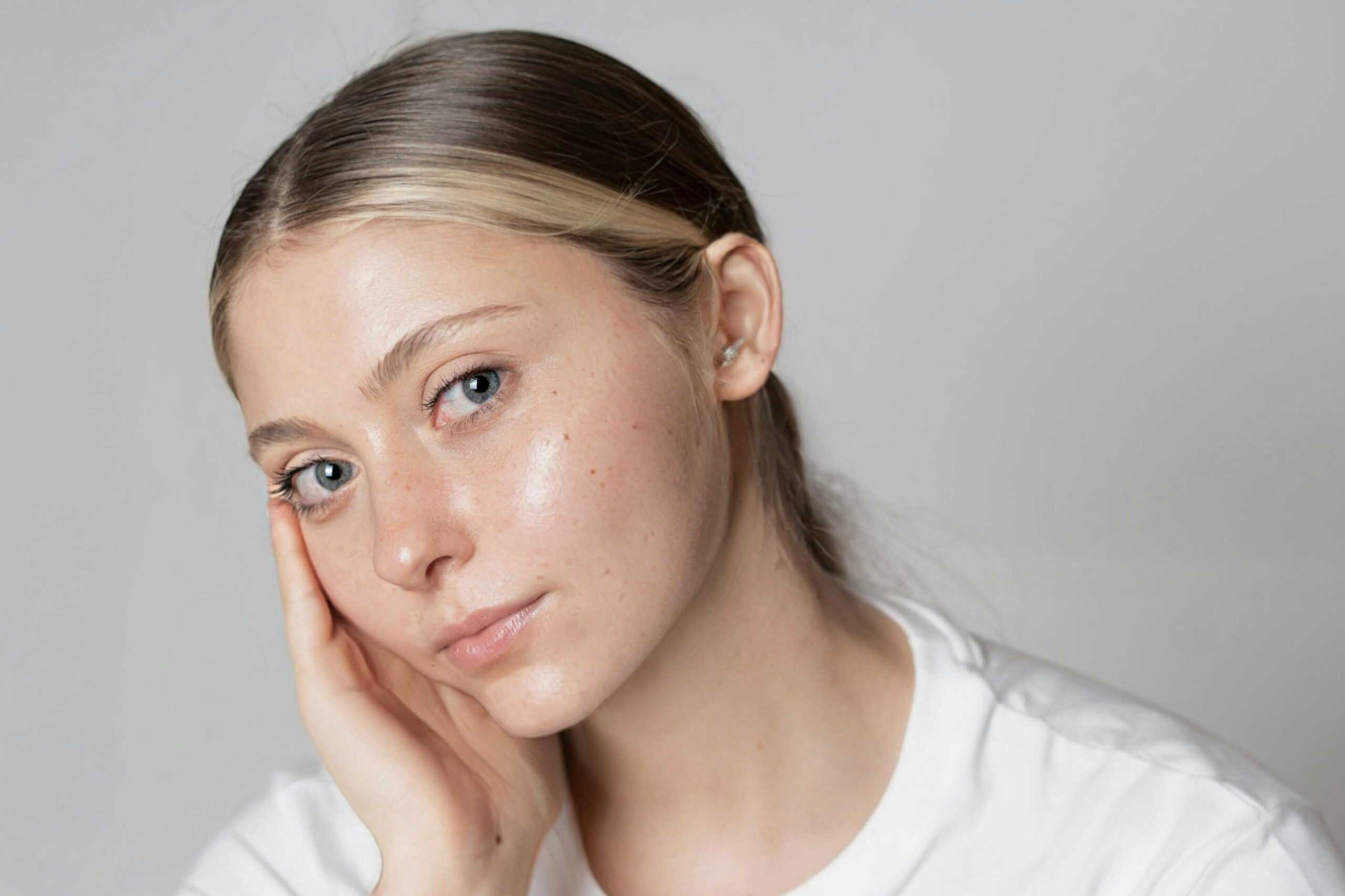 Cosmetic acupuncture session with fine needles improving skin tone and glowing skin.