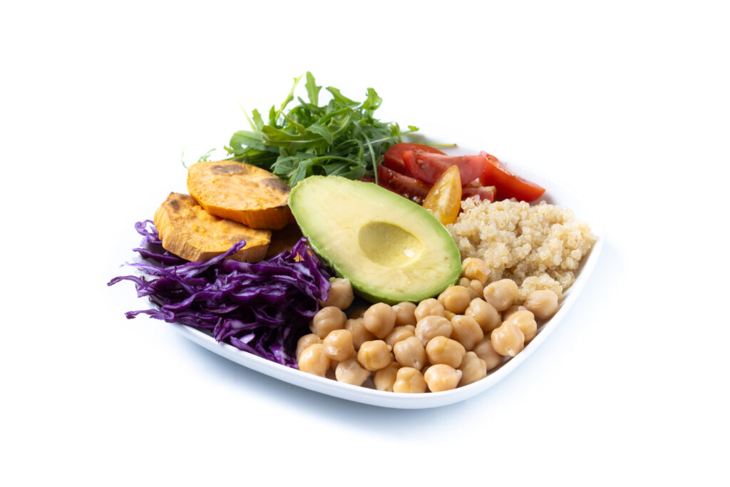 Healthy salad with avocado,lettuce,tomato and chickpeas isolated